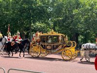 The King and the Queen on the way back to Buckingham Palace after the King&#039;s Speech